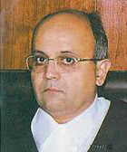Is Justice Dharmadhikari moving to Kerala High Court?